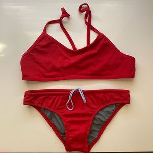 Jolyn swim red bikini top Laine L & bottom Andy M